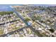 Aerial view of the waterfront community highlighting the canal-front homes and water access at 13437 Lisa Dr, Hudson, FL 34667