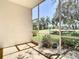 Screened porch overlooking the backyard, perfect for enjoying the outdoors at 13542 Norman Cir, Hudson, FL 34669