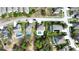 Overhead view of homes showcasing pools, landscaping, and neighborhood layout at 13856 Crest Lake Dr, Hudson, FL 34669
