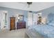 Airy main bedroom features a ceiling fan and large closet space for organized living at 1400 1St W Ave # G1, Bradenton, FL 34205