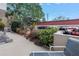 Lounge chairs overlooking lush landscaping and serene outdoor ambiance at 1400 1St W Ave # G1, Bradenton, FL 34205