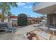 Enjoy outdoor living on this spacious patio with fountain and comfortable lounge chair at 1400 1St W Ave # G1, Bradenton, FL 34205