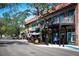 Street view of shopping and restaurant district with patio seating and pedestrian access at 1400 1St W Ave # G1, Bradenton, FL 34205