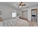 Bedroom featuring a closet, natural light, and door to other parts of the house at 1425 Monte Lake Dr, Valrico, FL 33596
