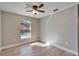 Bedroom featuring a window view of the pool and natural light at 1425 Monte Lake Dr, Valrico, FL 33596