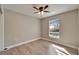 Bedroom featuring a window view of the pool and natural light at 1425 Monte Lake Dr, Valrico, FL 33596