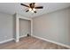 Bedroom featuring a closet, natural light, and a ceiling fan at 1425 Monte Lake Dr, Valrico, FL 33596