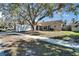 A well-manicured lawn surrounds this home, creating an inviting curb appeal to this property at 1425 Monte Lake Dr, Valrico, FL 33596