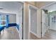 Hallway leading to bedrooms and bathrooms featuring natural light at 1425 Monte Lake Dr, Valrico, FL 33596