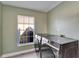 Stylish laundry room featuring a window view and sleek washer and dryer at 1425 Monte Lake Dr, Valrico, FL 33596