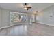 Spacious living room with a large bay window and ample natural light at 1425 Monte Lake Dr, Valrico, FL 33596