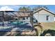Enjoy a screened-in pool in this home's backyard, for seamless indoor-outdoor living at 1425 Monte Lake Dr, Valrico, FL 33596