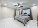 Spacious main bedroom with ceiling fan, recessed lighting, and large window at 15 Tads Trl, Oldsmar, FL 34677