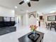 Bright, open concept living area connecting the kitchen, dining, and living spaces at 15 Tads Trl, Oldsmar, FL 34677