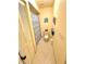 Narrow bathroom featuring a toilet and shower/bath with curtain at 1801 E Lake Rd # 6B, Palm Harbor, FL 34685