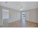 Bright bedroom with stylish tile flooring, ceiling fan, walk-in closet and water views at 19029 Us Highway 19 N # 17A, Clearwater, FL 33764