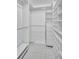 Walk-in closet with custom shelves and drawers for ample storage at 19029 Us Highway 19 N # 17A, Clearwater, FL 33764