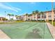 Community shuffleboard courts offer a fun outdoor activity for residents with lush landscaping and nearby condos at 19029 Us Highway 19 N # 17A, Clearwater, FL 33764