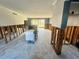 Room featuring exposed studs, tile floors, and an open layout with appliances in view at 200 Country Club Dr # 1001, Largo, FL 33771