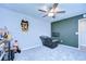 Comfortable bedroom with ample space, chair and desk at 22167 Tucana Way, Land O Lakes, FL 34637