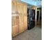 Spacious kitchen offering plenty of cabinet space and a modern, stainless steel refrigerator at 2510 Cypress Bend E Dr, Clearwater, FL 33761