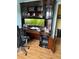 Office featuring a wooden desk with lots of storage at 2510 Cypress Bend E Dr, Clearwater, FL 33761