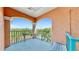 Private balcony offers stunning views of lush greenery and blue waters for relaxation and enjoyment at 2773 Via Cipriani # 1330B, Clearwater, FL 33764
