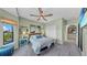 Inviting bedroom with a serene color scheme, plush carpet, and abundant natural light at 2773 Via Cipriani # 1330B, Clearwater, FL 33764