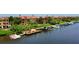 Scenic waterfront with boat docks, kayaks, and a covered picnic area for residents' enjoyment at 2773 Via Cipriani # 1330B, Clearwater, FL 33764