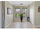 Charming dining area with natural light, complemented by stylish decor and a serene view at 2773 Via Cipriani # 1330B, Clearwater, FL 33764