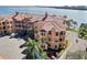 Stunning waterfront condo building with lush landscaping and access to beautiful bay views at 2773 Via Cipriani # 1330B, Clearwater, FL 33764