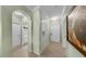 Hallway with tile flooring, and white doors at 2773 Via Cipriani # 1330B, Clearwater, FL 33764