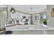 Stylish kitchen with a quartz countertop, stainless steel appliances, and ample storage at 2773 Via Cipriani # 1330B, Clearwater, FL 33764