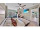 Spacious main bedroom with ceiling fan, sitting area and lots of natural light at 2773 Via Cipriani # 1330B, Clearwater, FL 33764