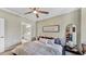 Cozy main bedroom with ensuite bathroom and views of the water at 2773 Via Cipriani # 1330B, Clearwater, FL 33764