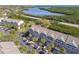 Beautiful aerial view of the townhome community, featuring well-maintained landscaping and ample parking at 31 Estuary Trl, Clearwater, FL 33759
