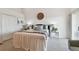 Comfortable bedroom with a well-made bed, accent table and tasteful decor at 31 Estuary Trl, Clearwater, FL 33759