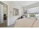 Bright bedroom with a comfortable bed and soft natural light, creating a calm and peaceful environment at 31 Estuary Trl, Clearwater, FL 33759