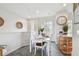 Cozy dining area with a table set for a meal next to the kitchen at 31 Estuary Trl, Clearwater, FL 33759