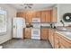 Efficient kitchen featuring modern appliances, ample storage, and a convenient layout for seamless meal preparation and dining at 31 Estuary Trl, Clearwater, FL 33759