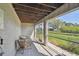 Relaxing screened lanai with a beautiful view, creating a serene space to unwind and appreciate nature at 31 Estuary Trl, Clearwater, FL 33759
