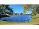 Panoramic water view includes mature trees and an open waterway at 3506 Moog Rd, Holiday, FL 34691