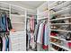 Spacious closet featuring custom shelves, drawers and hanging storage for optimal organization at 3605 W Santiago St, Tampa, FL 33629