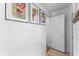 Bright hallway with Gathering photos and access to other rooms at 423 Shaddock St, Tarpon Springs, FL 34689