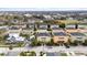 Street view of colorful, well-maintained homes in a friendly neighborhood at 423 Shaddock St, Tarpon Springs, FL 34689