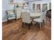 Elegant dining room with hardwood floors, stylish furniture, and natural light at 4588 Baycedar Ln, Sarasota, FL 34241