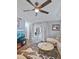 Inviting living room with vaulted ceilings, hardwood floors, and lots of natural light at 4588 Baycedar Ln, Sarasota, FL 34241