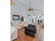 The open living room offers plenty of seating, natural light, and a smooth transition to the kitchen and other living spaces at 4588 Baycedar Ln, Sarasota, FL 34241