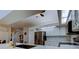 Bright kitchen features stainless appliances, marble backsplash, and a sleek gooseneck faucet at 4967 162Nd N Ave, Clearwater, FL 33760
