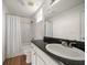 Bright bathroom featuring a shower with white marble and granite counters at 501 Knights Run Ave # 2101, Tampa, FL 33602